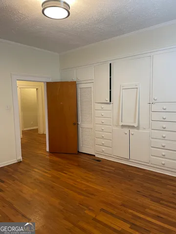 a view of basketball room with wooden floor
