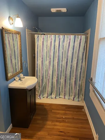 a view of closet area with empty racks