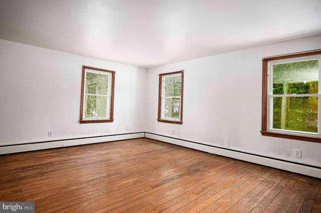 a view of a house with wooden stairs