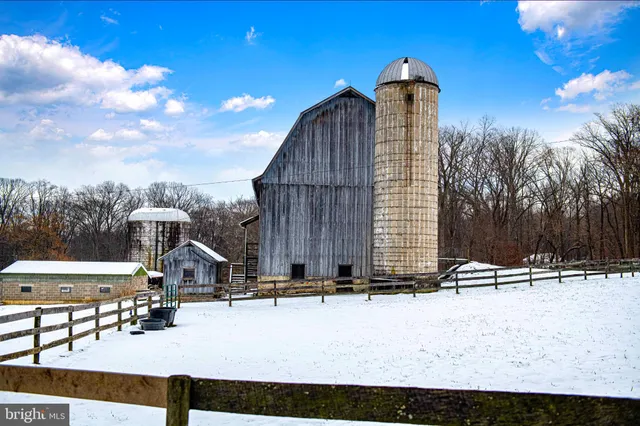 a view of a buildings with a tree