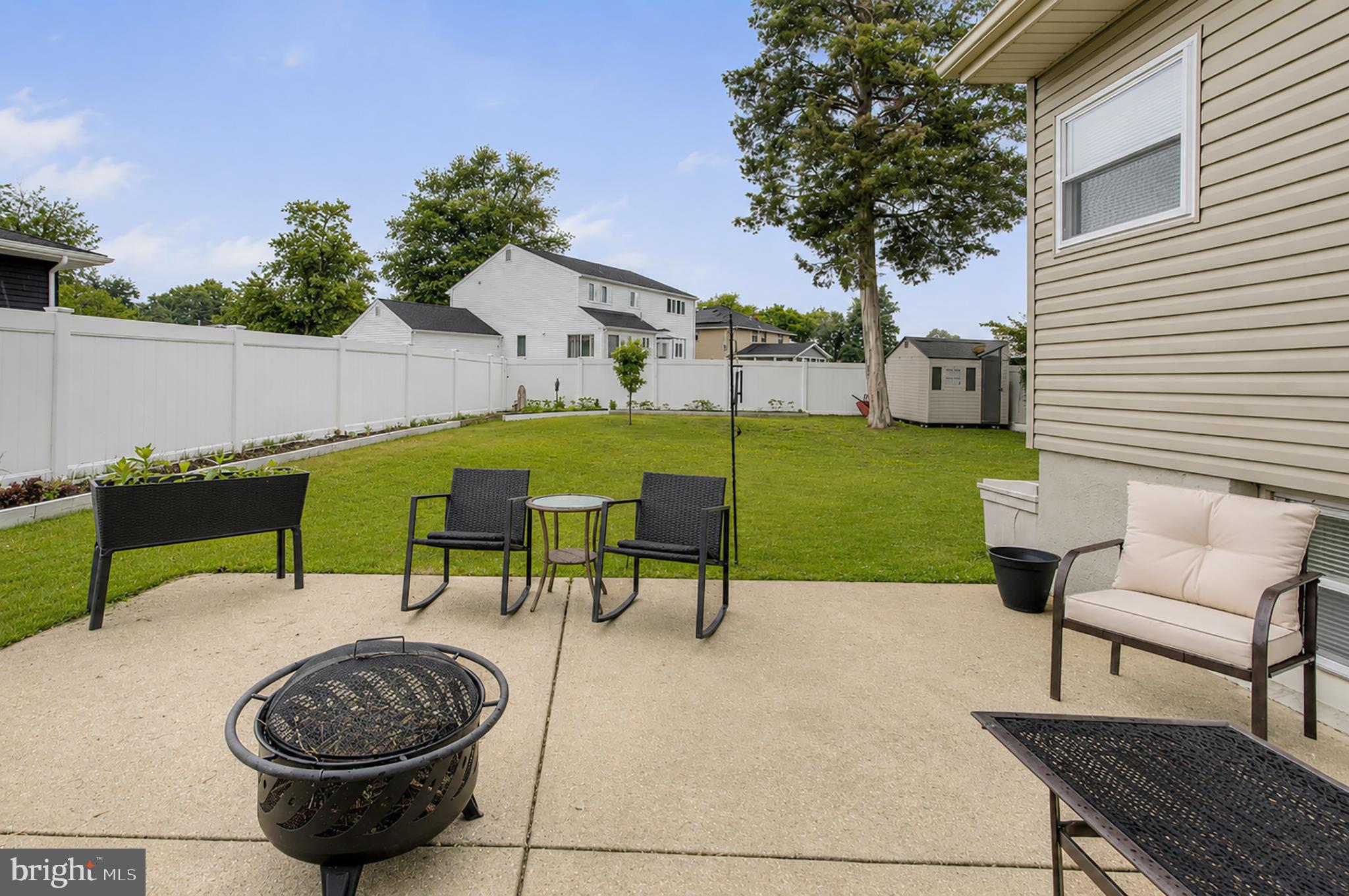 32 Bryant Road Turnersville, NJ 08012 - Photo 30 of 33 a view of a swimming pool with a table and chairs