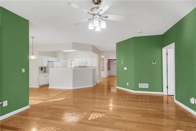 a view of a kitchen with a sink and a kitchen