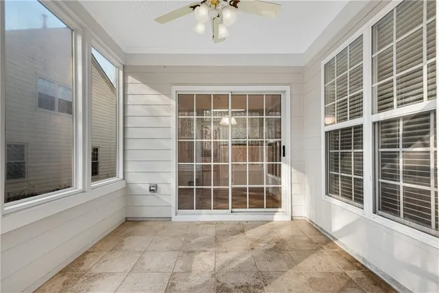 a view of empty room with windows