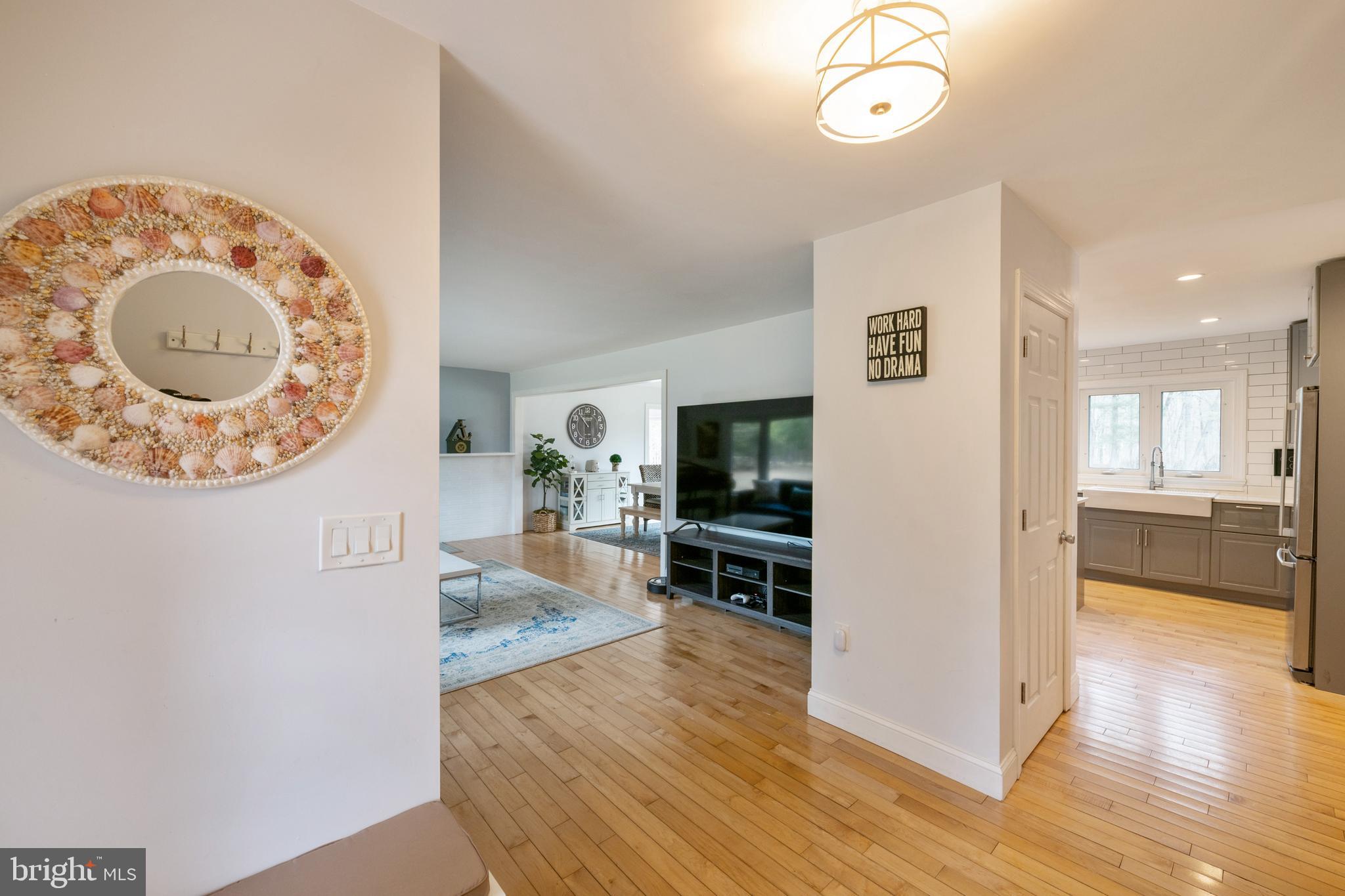 184 Carter Road Princeton, NJ 08540 - Photo 11 of 34 a view of a living room and a wooden floor