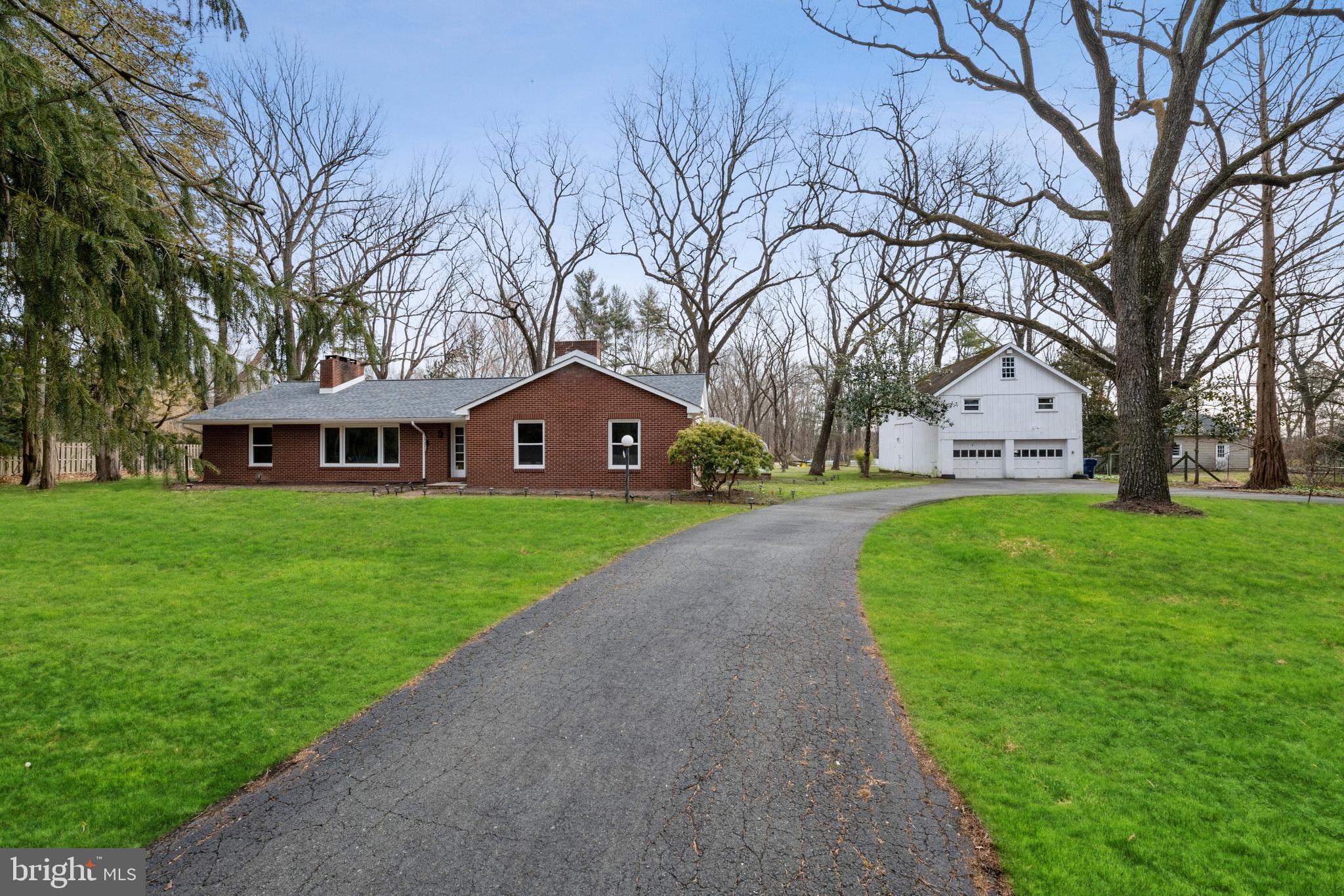 184 Carter Road Princeton, NJ 08540 - Photo 13 of 34 a front view of a house with garden
