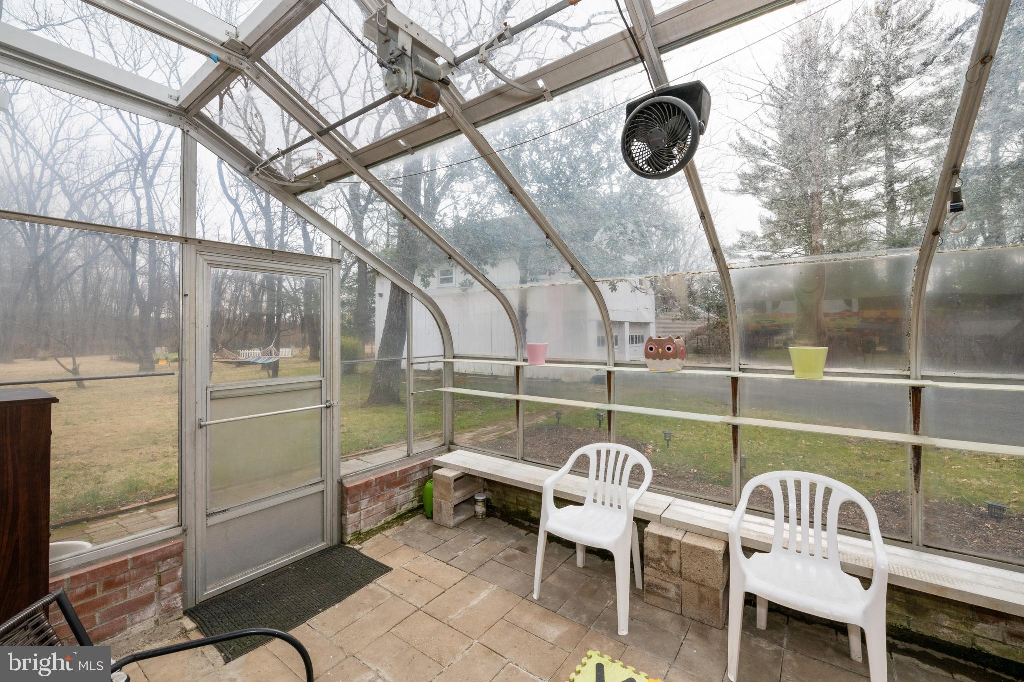 184 Carter Road Princeton, NJ 08540 - Photo 15 of 34 a balcony with table and chairs