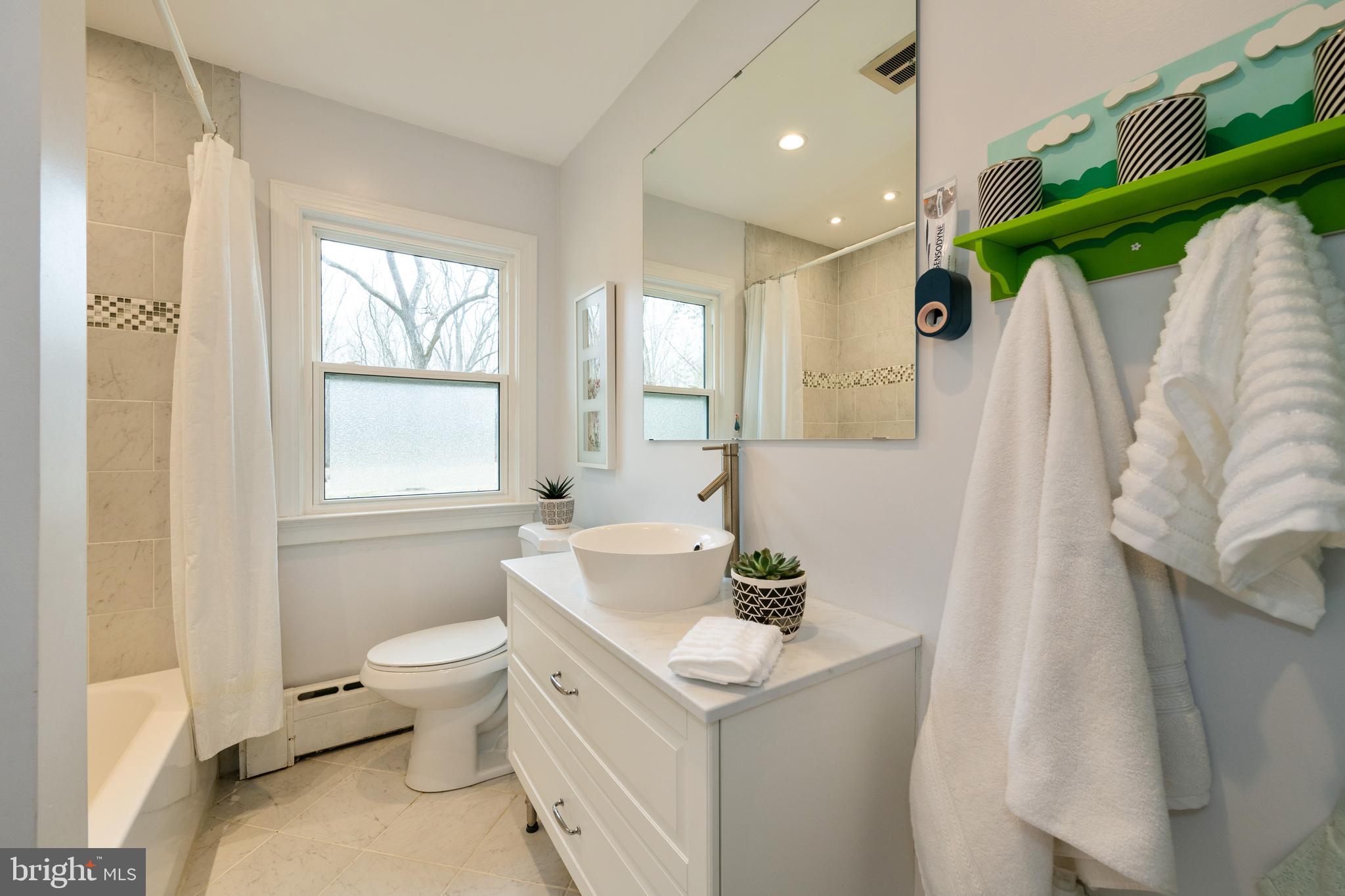 184 Carter Road Princeton, NJ 08540 - Photo 17 of 34 a bathroom with a sink toilet and shower