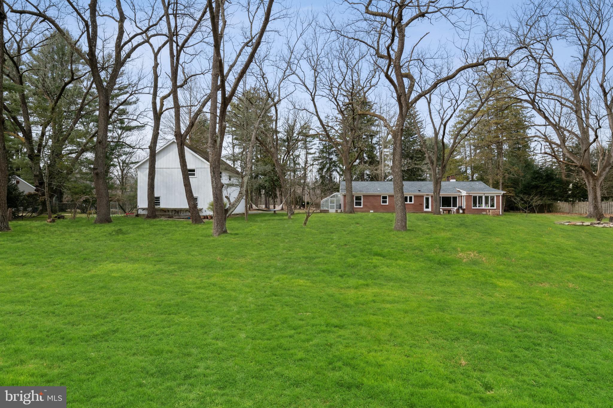 184 Carter Road Princeton, NJ 08540 - Photo 18 of 34 a view of a park with large trees