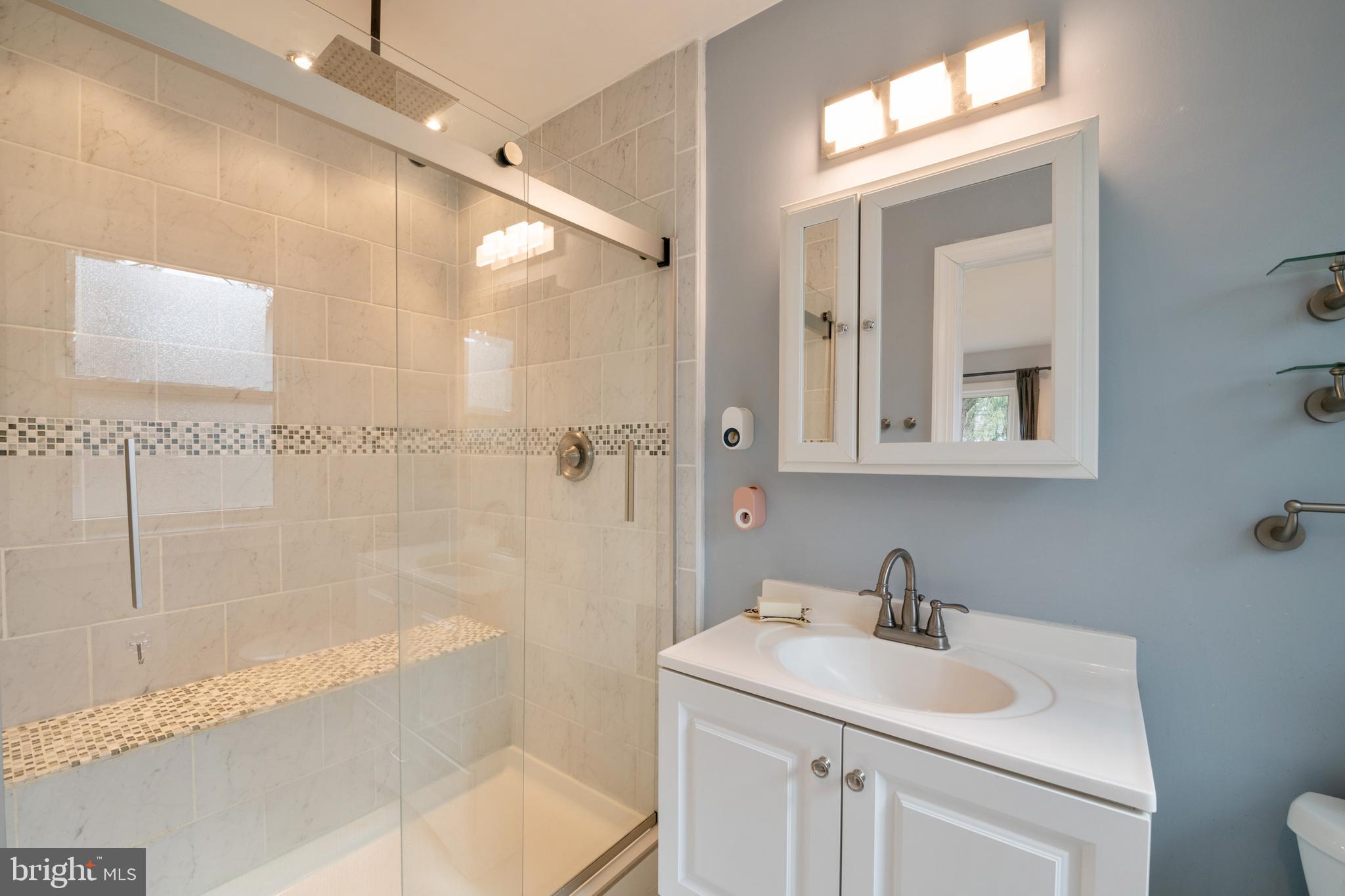 184 Carter Road Princeton, NJ 08540 - Photo 24 of 34 a bathroom with a sink toilet tub and shower