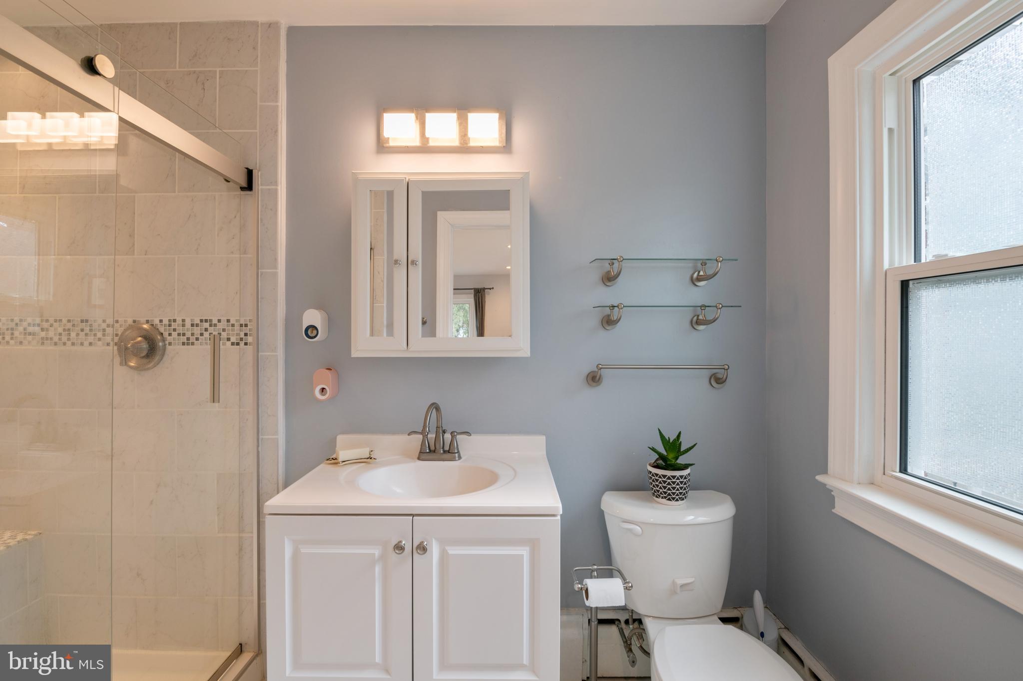 184 Carter Road Princeton, NJ 08540 - Photo 25 of 34 a bathroom with a sink toilet and shower