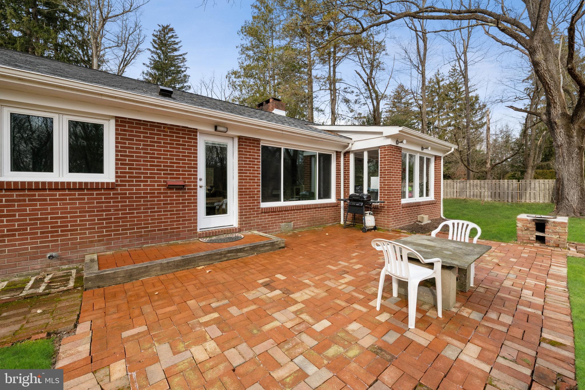 184 Carter Road Princeton, NJ 08540 - Photo 31 of 34 a view of a house with backyard sitting area and garden