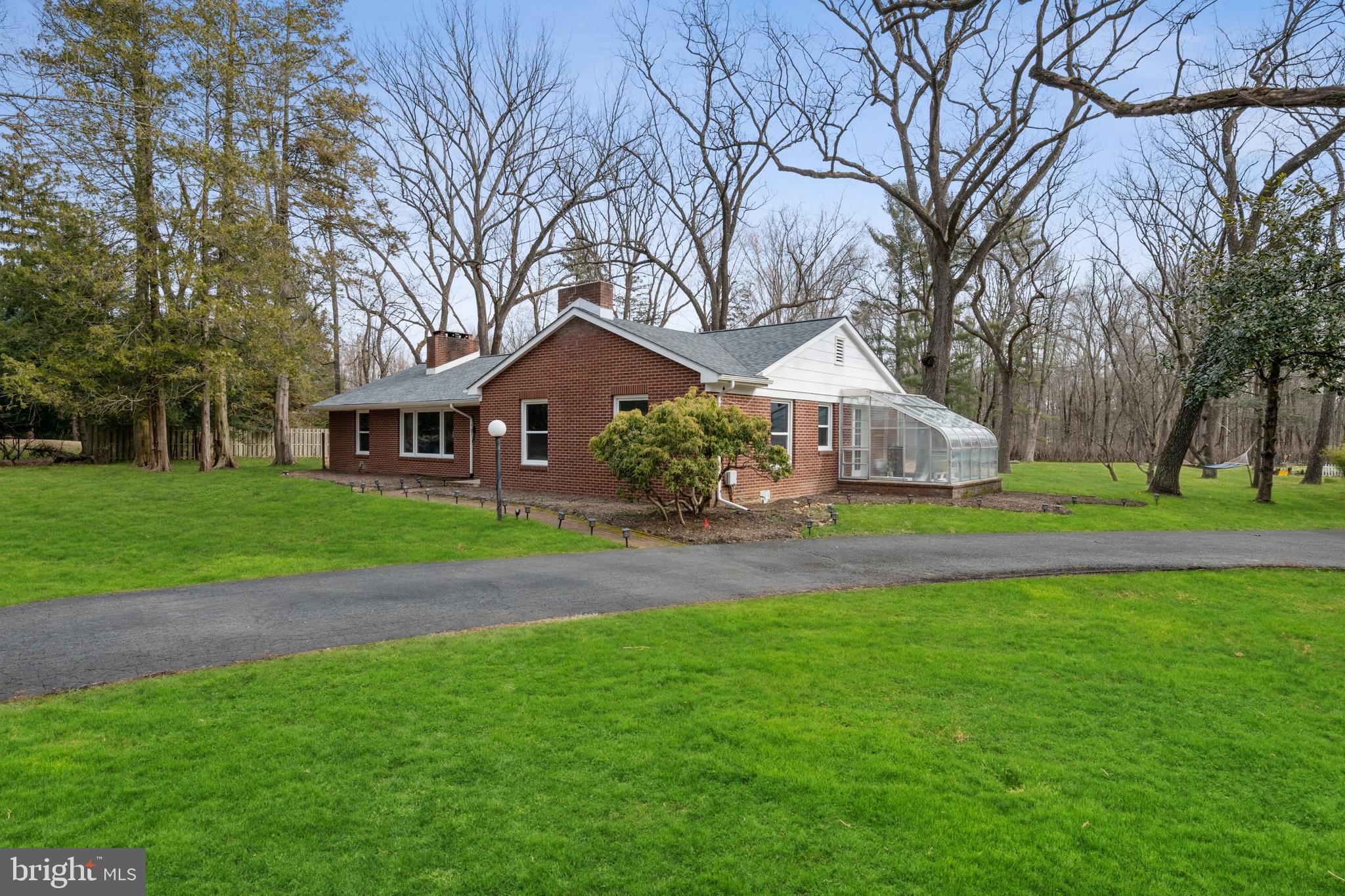 184 Carter Road Princeton, NJ 08540 - Photo 33 of 34 a front view of house with yard and green space