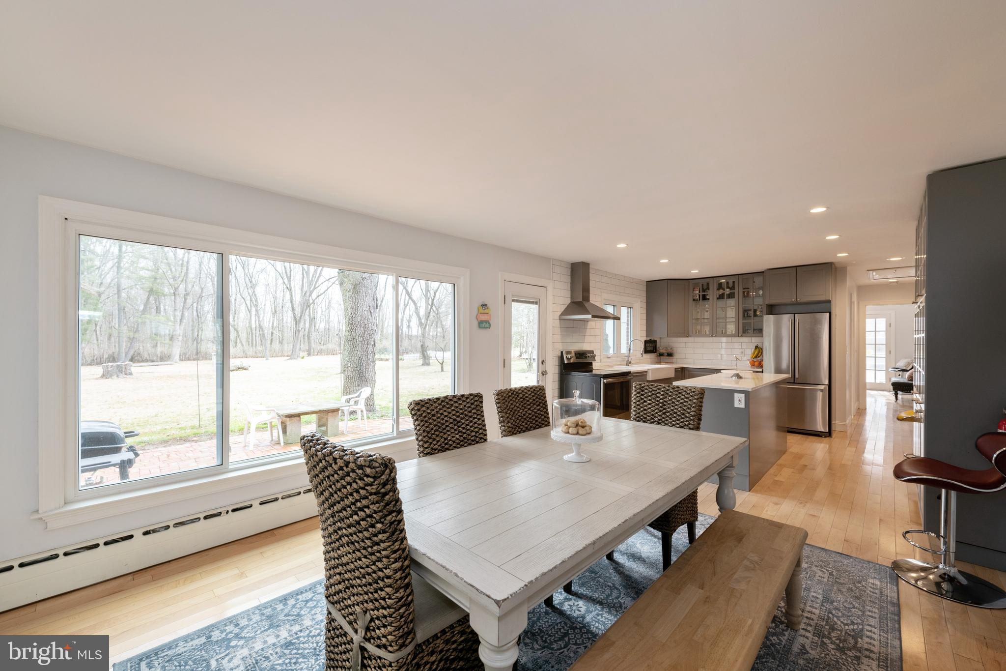 184 Carter Road Princeton, NJ 08540 - Photo 7 of 34 a living room with stainless steel appliances furniture a dining table and chairs