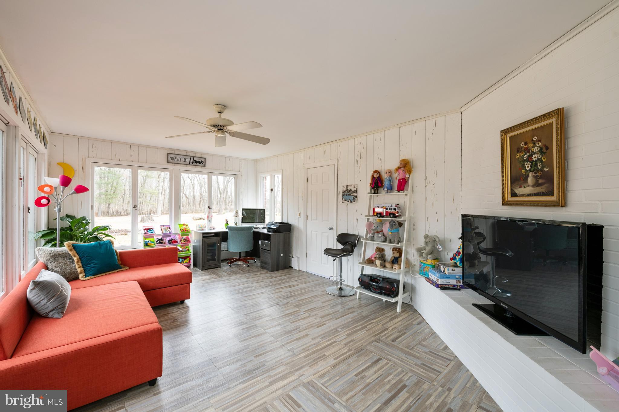 184 Carter Road Princeton, NJ 08540 - Photo 10 of 34 a living room with furniture and a flat screen tv