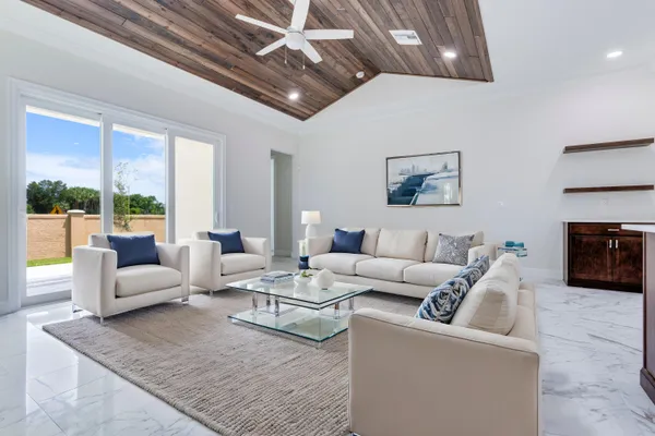 a kitchen with stainless steel appliances a refrigerator and a stove