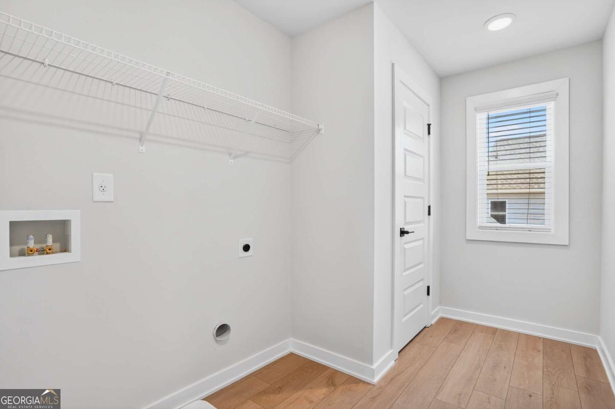 613 Villa Rica Springs Villa Rica, GA 30180 - Photo 22 of 40 a view of room with window and hardwood floor