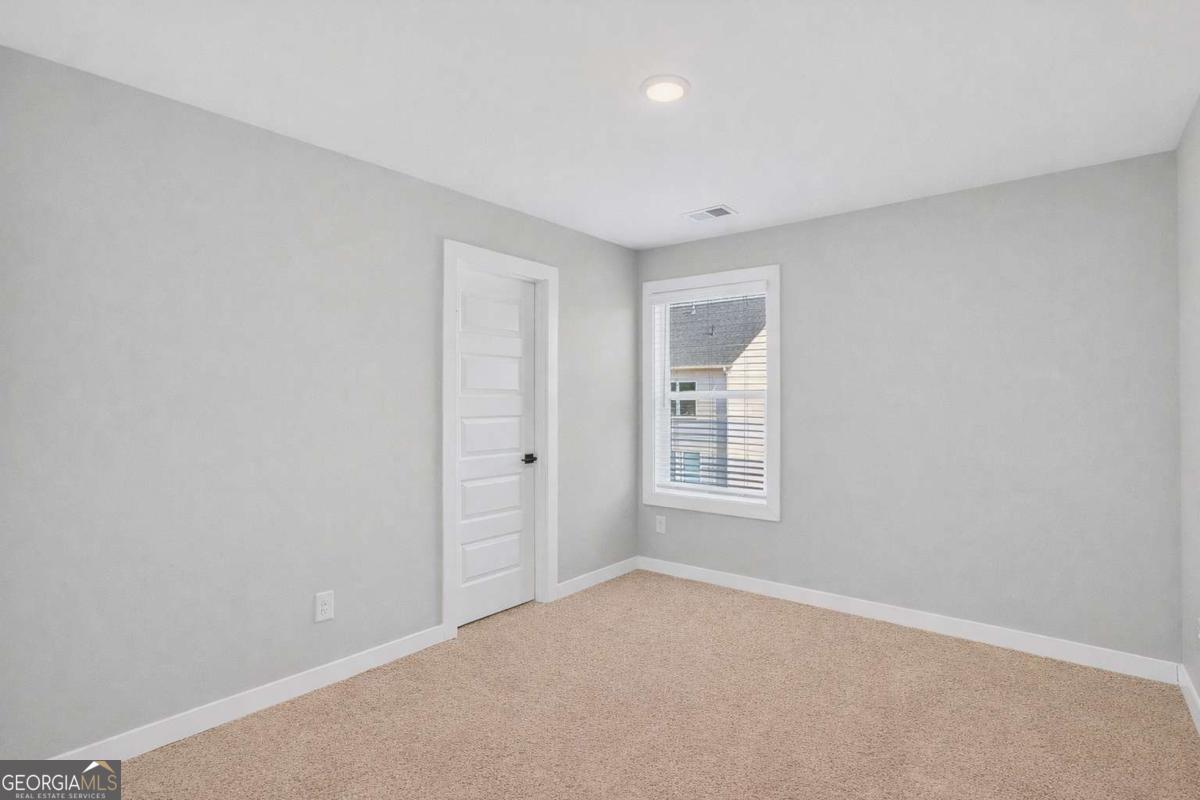 613 Villa Rica Springs Villa Rica, GA 30180 - Photo 26 of 40 a view of an empty room with a window