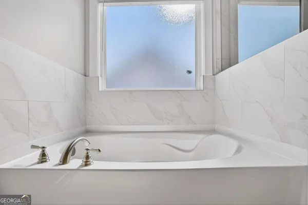 a bathroom with a bathtub
