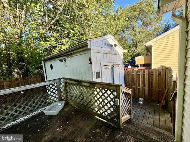 a view of a chairs and table on the wooden floor