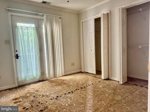 an empty room with windows