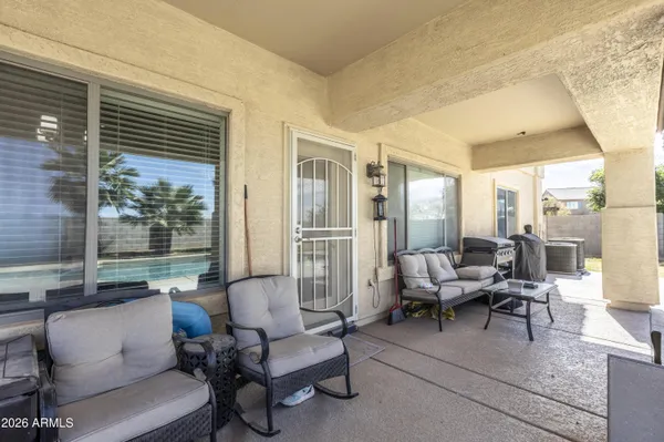 a outdoor space with patio the couches and a dining table with garden view