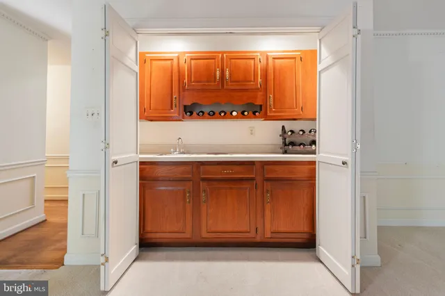 a bathroom with a sink and a large mirror