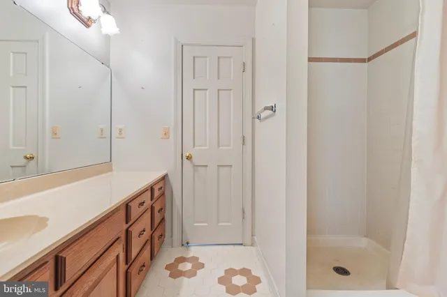 a bathroom with a bathtub and a sink