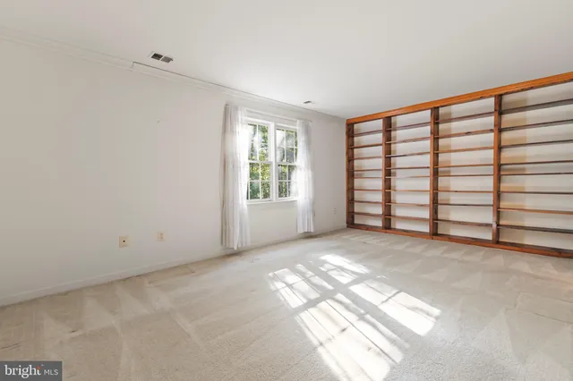 a view of a room with windows