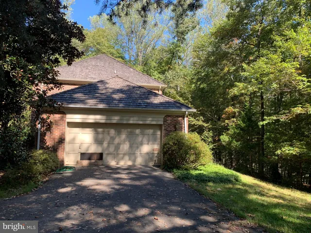 a view of the house and a yard