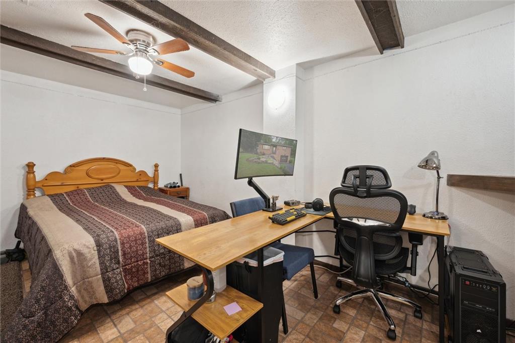 233 Valley Road Canonsburg, PA 15317 - Photo 27 of 39 a bedroom with bed and a chandelier