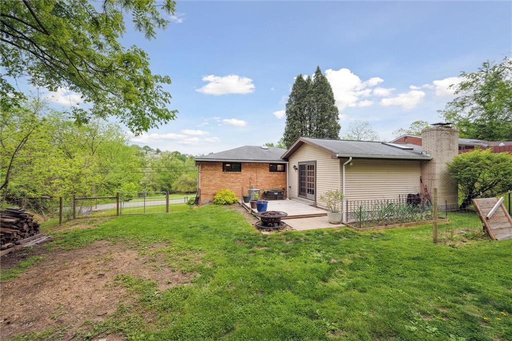 233 Valley Road Canonsburg, PA 15317 - Photo 34 of 39 a front view of a house with a yard and trees