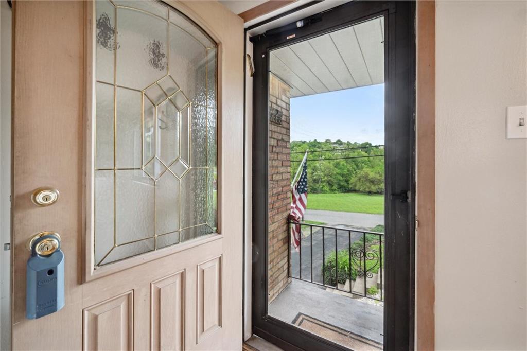 233 Valley Road Canonsburg, PA 15317 - Photo 5 of 39 a view of a glass door with a balcony