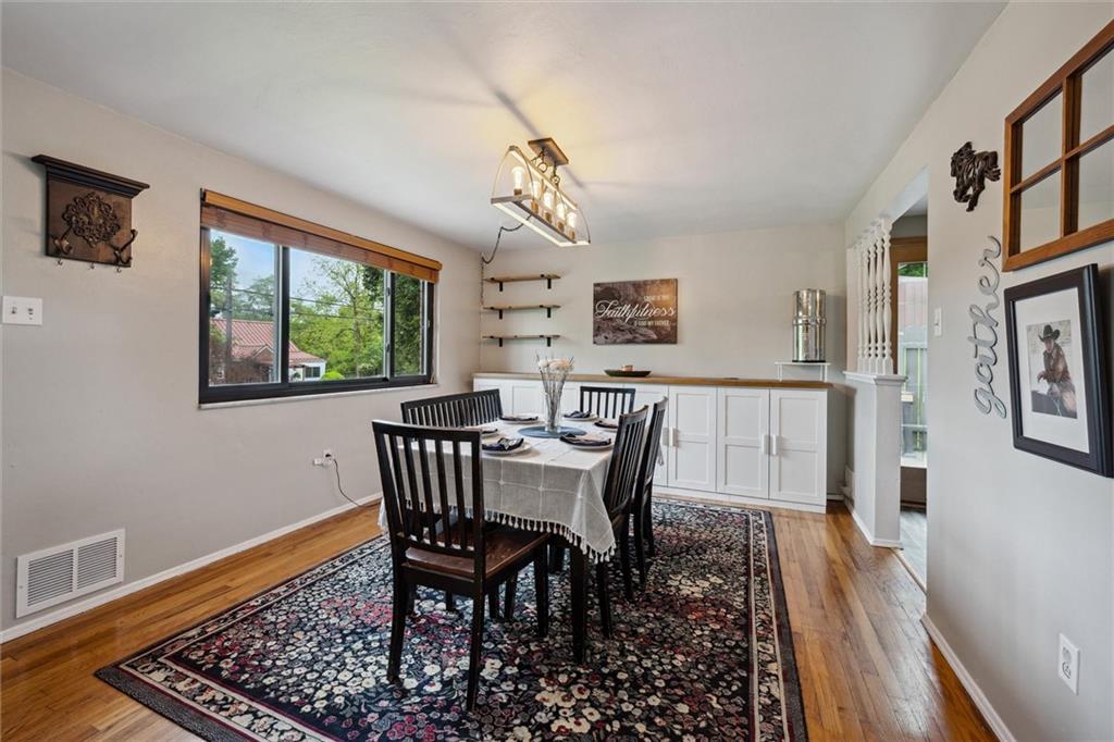 233 Valley Road Canonsburg, PA 15317 - Photo 6 of 39 a view of a dining room with furniture a rug and wooden floor