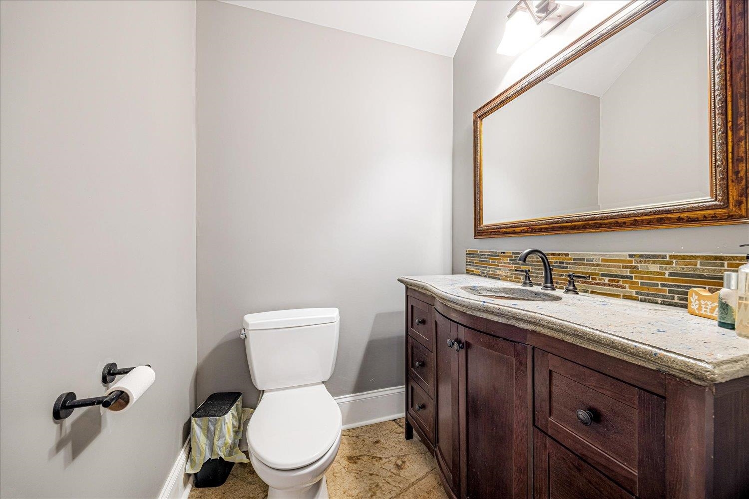 897 Burrowtown Road Mason, TN 38049 - Photo 12 of 36 Bathroom featuring backsplash and vanity