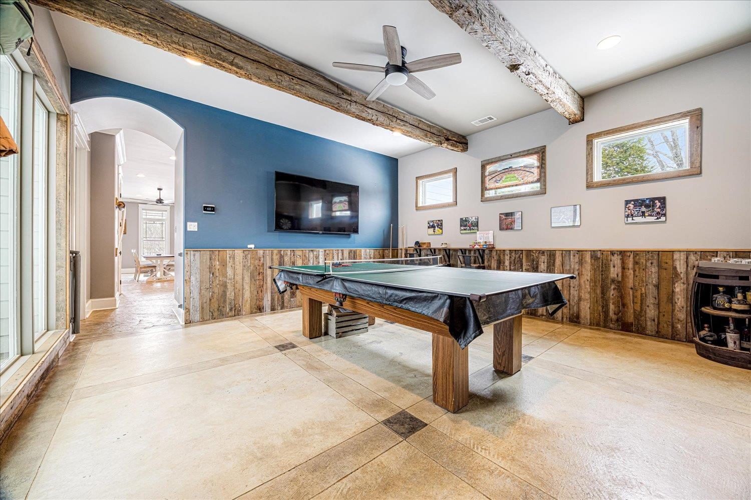 897 Burrowtown Road Mason, TN 38049 - Photo 24 of 36 Rec room with ceiling fan, wainscoting, wood walls, arched walkways, and pool table