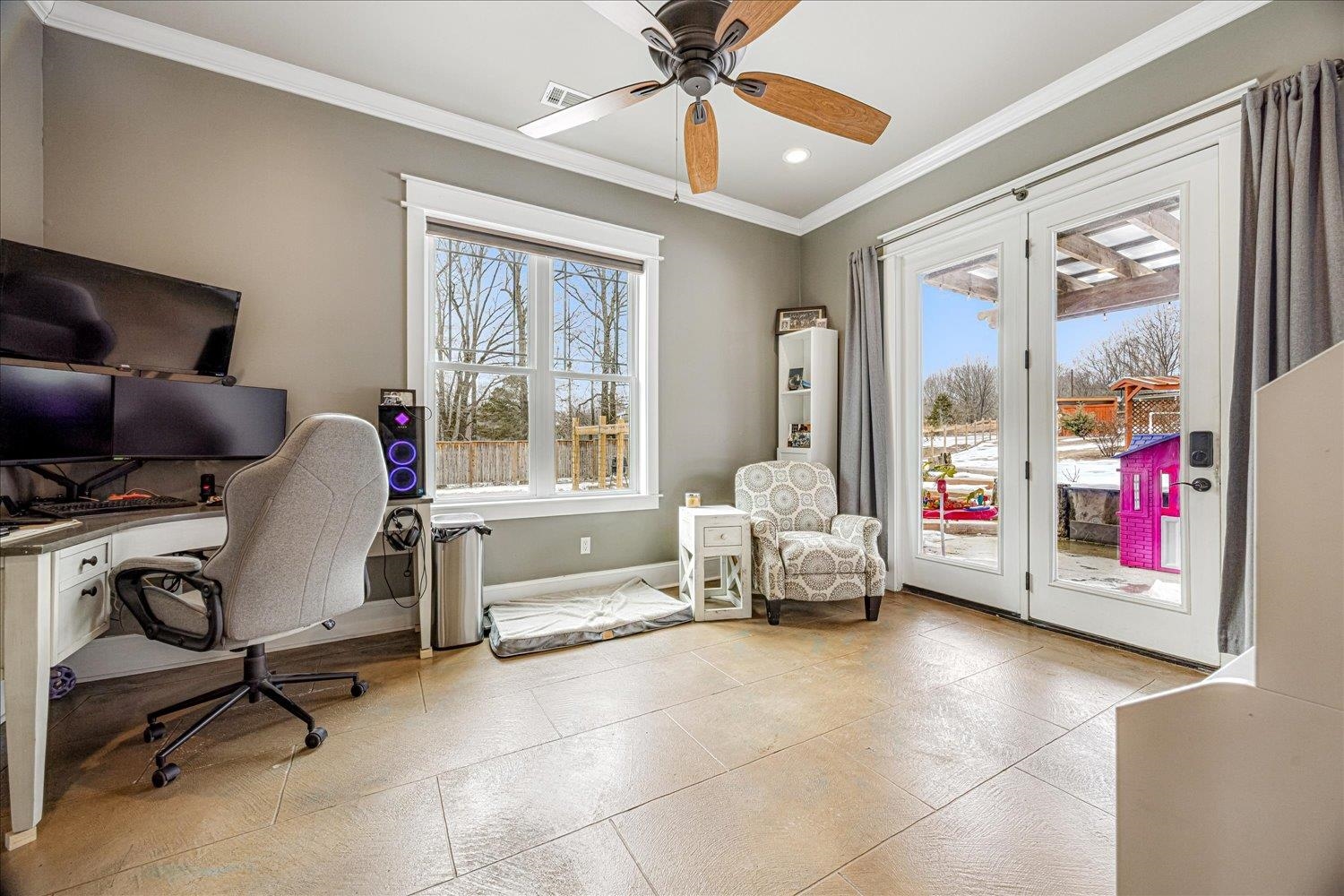 897 Burrowtown Road Mason, TN 38049 - Photo 25 of 36 Office area with crown molding, plenty of natural light, ceiling fan, and recessed lighting