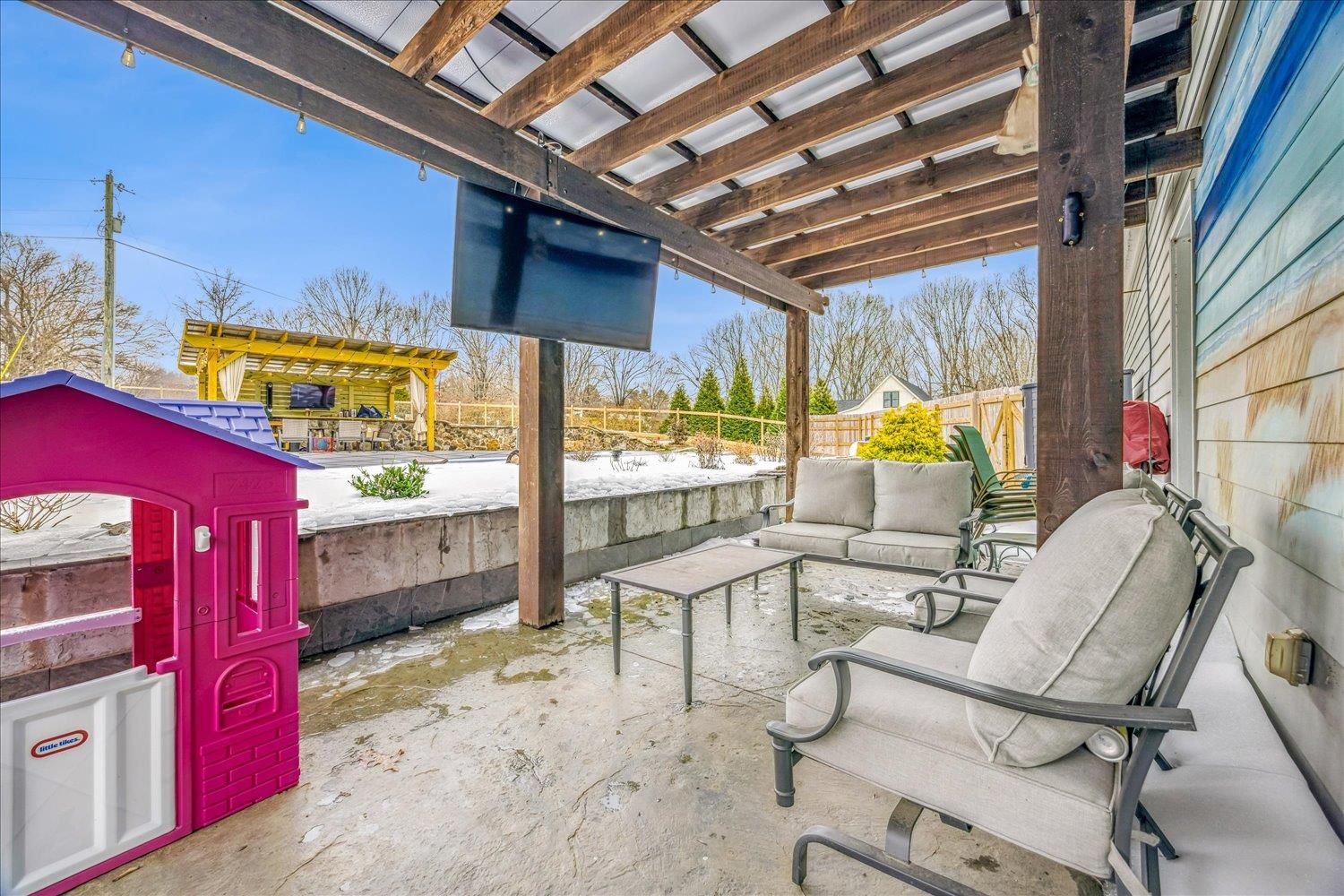 897 Burrowtown Road Mason, TN 38049 - Photo 27 of 36 View of patio / terrace with an outdoor living space and a pergola