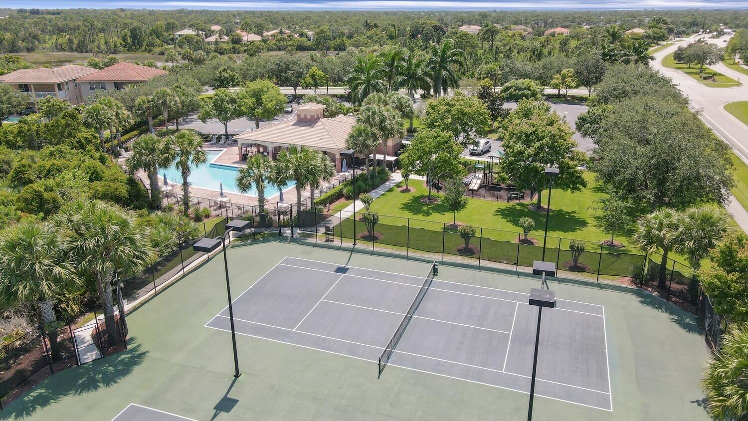 5410 Southeast Mitchell Lane Stuart, FL 34997 - Photo 24 of 24 a view of a tennis court