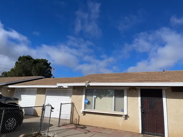a view of house with outdoor space
