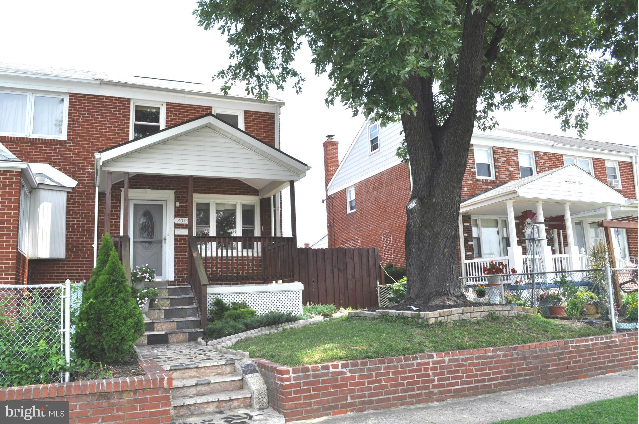 2041 Inverton Road Baltimore, MD 21222 - Photo 1 of 27 front view of a house with a yard