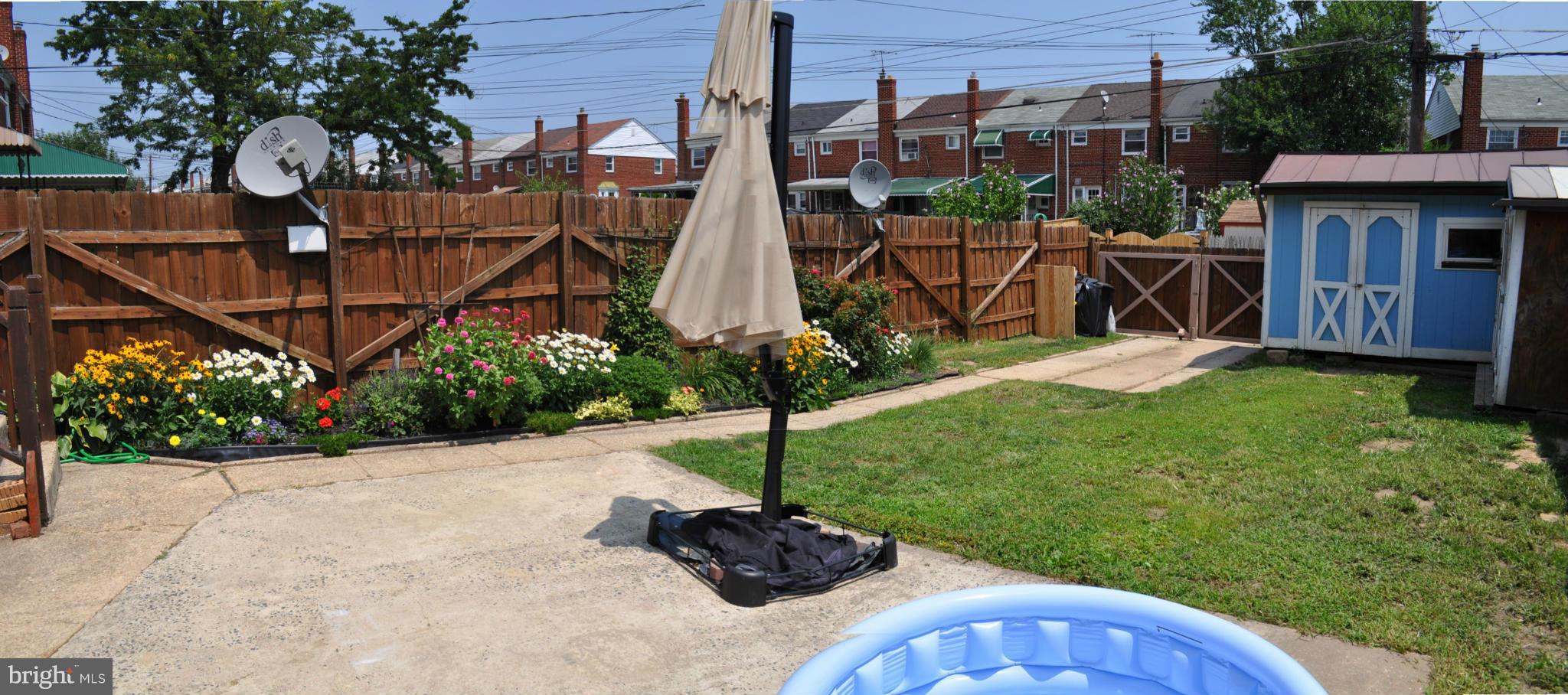 2041 Inverton Road Baltimore, MD 21222 - Photo 6 of 27 a view of a backyard with sitting area
