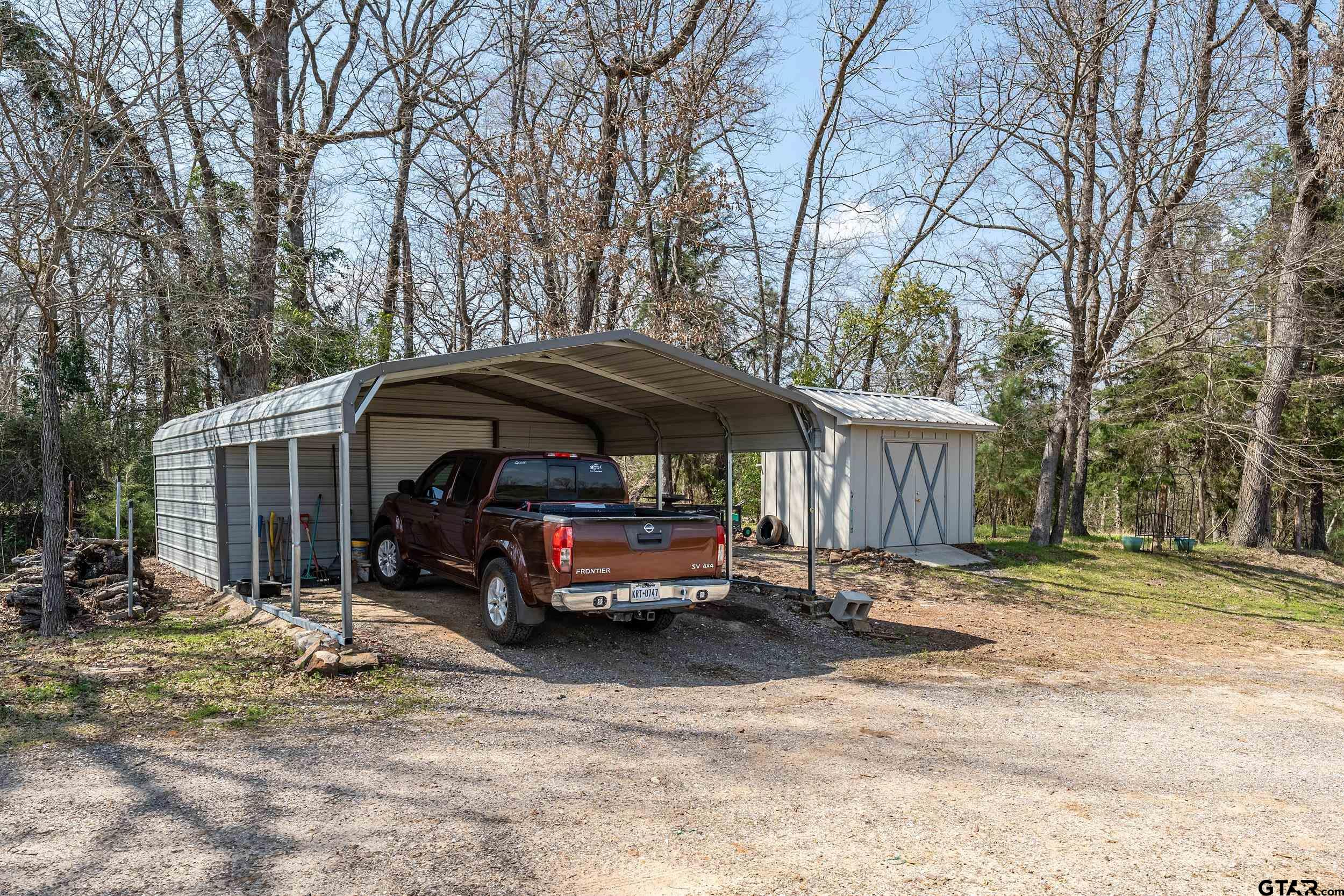 10918 Spring Club Lake Tyler, TX 75706 - Photo 23 of 23 a view of outdoor space yard and deck
