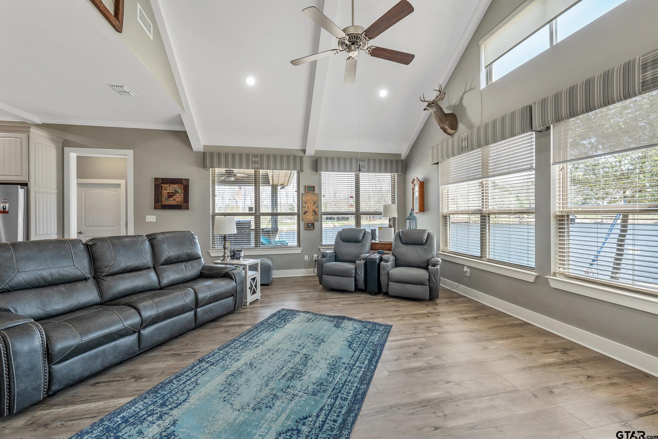 10918 Spring Club Lake Tyler, TX 75706 - Photo 8 of 23 a living room with furniture and a large window