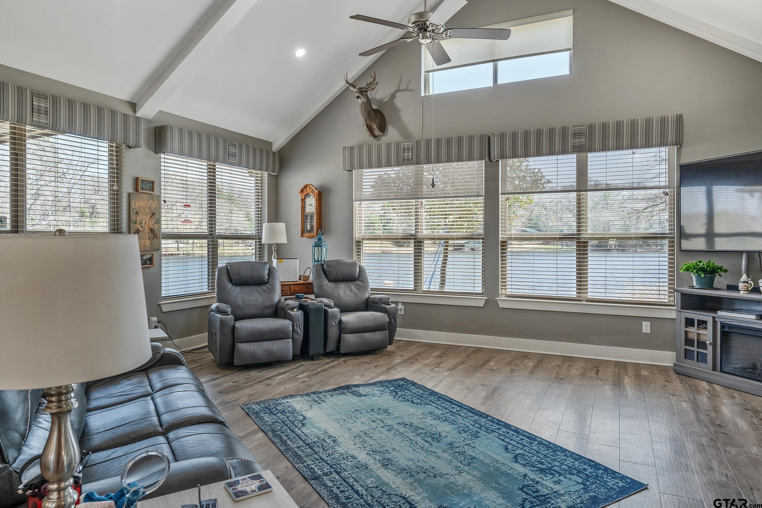 10918 Spring Club Lake Tyler, TX 75706 - Photo 9 of 23 a living room with furniture and a large window