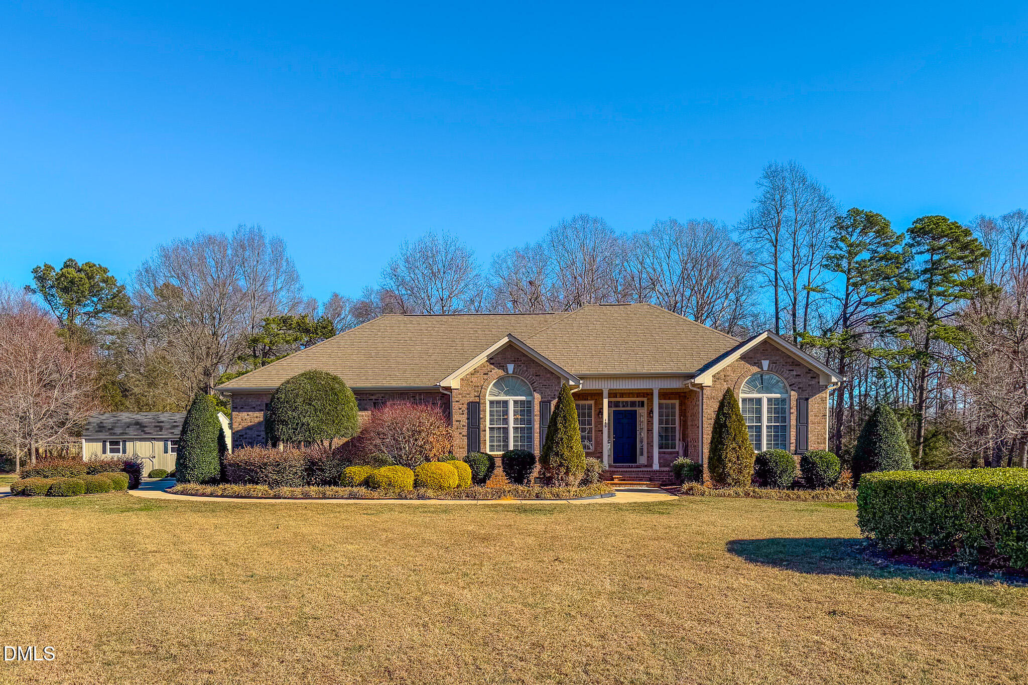 189 Hannah Lane Roxboro, NC 27574 - Photo 18 of 37 a front view of a house with a yard and garage