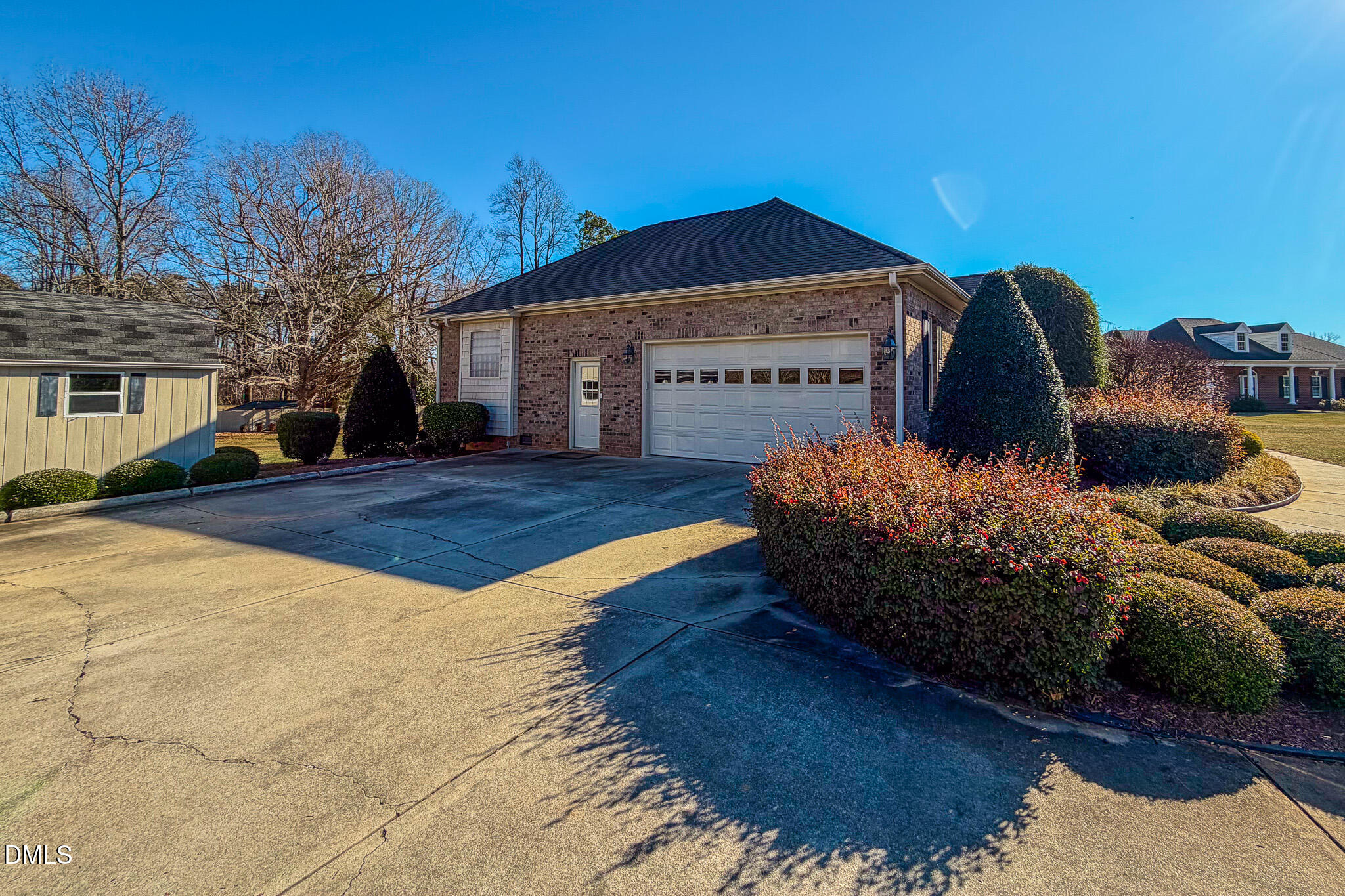 189 Hannah Lane Roxboro, NC 27574 - Photo 19 of 37 a front view of a house with garden