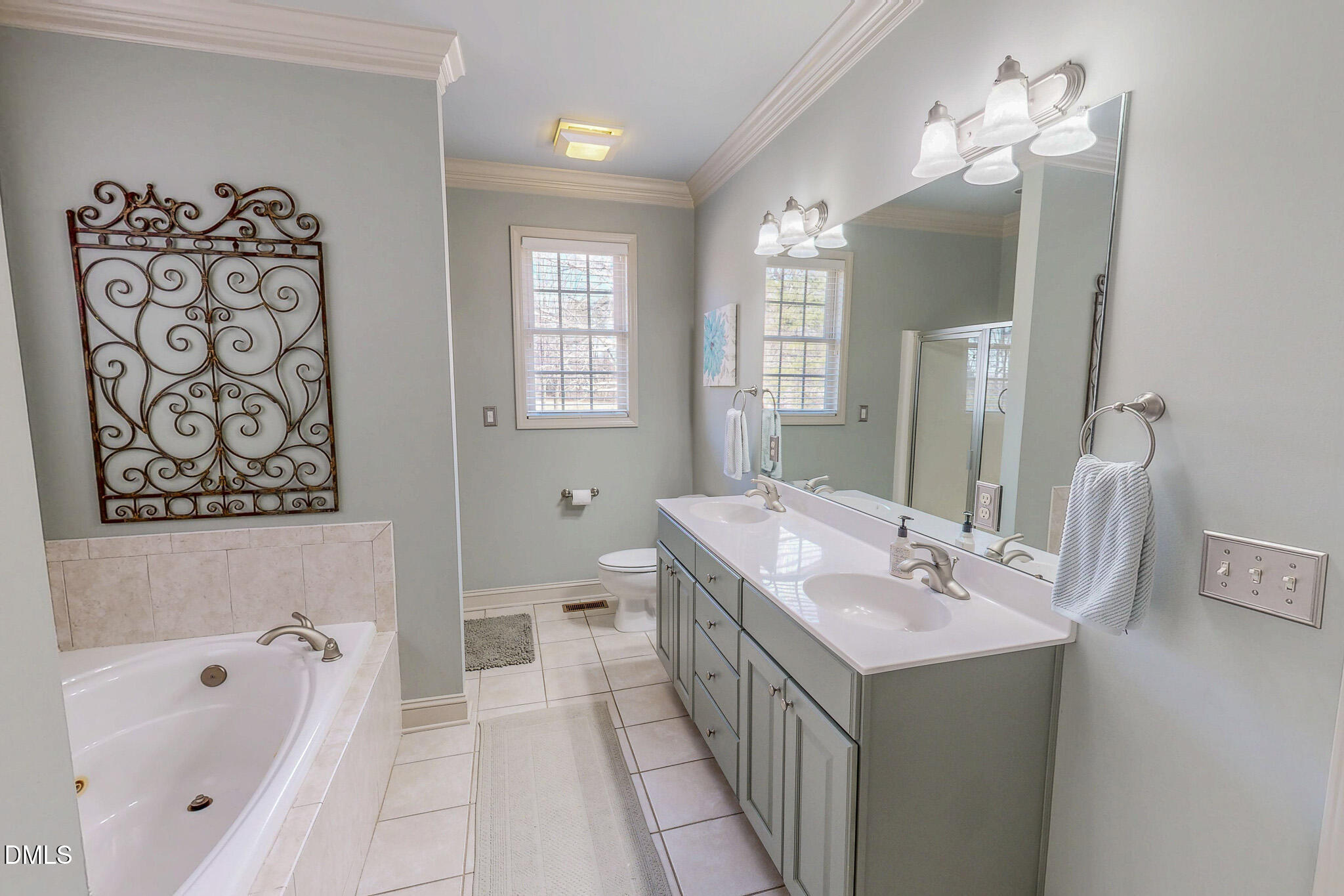 189 Hannah Lane Roxboro, NC 27574 - Photo 29 of 37 a spacious bathroom with a tub sink and mirror