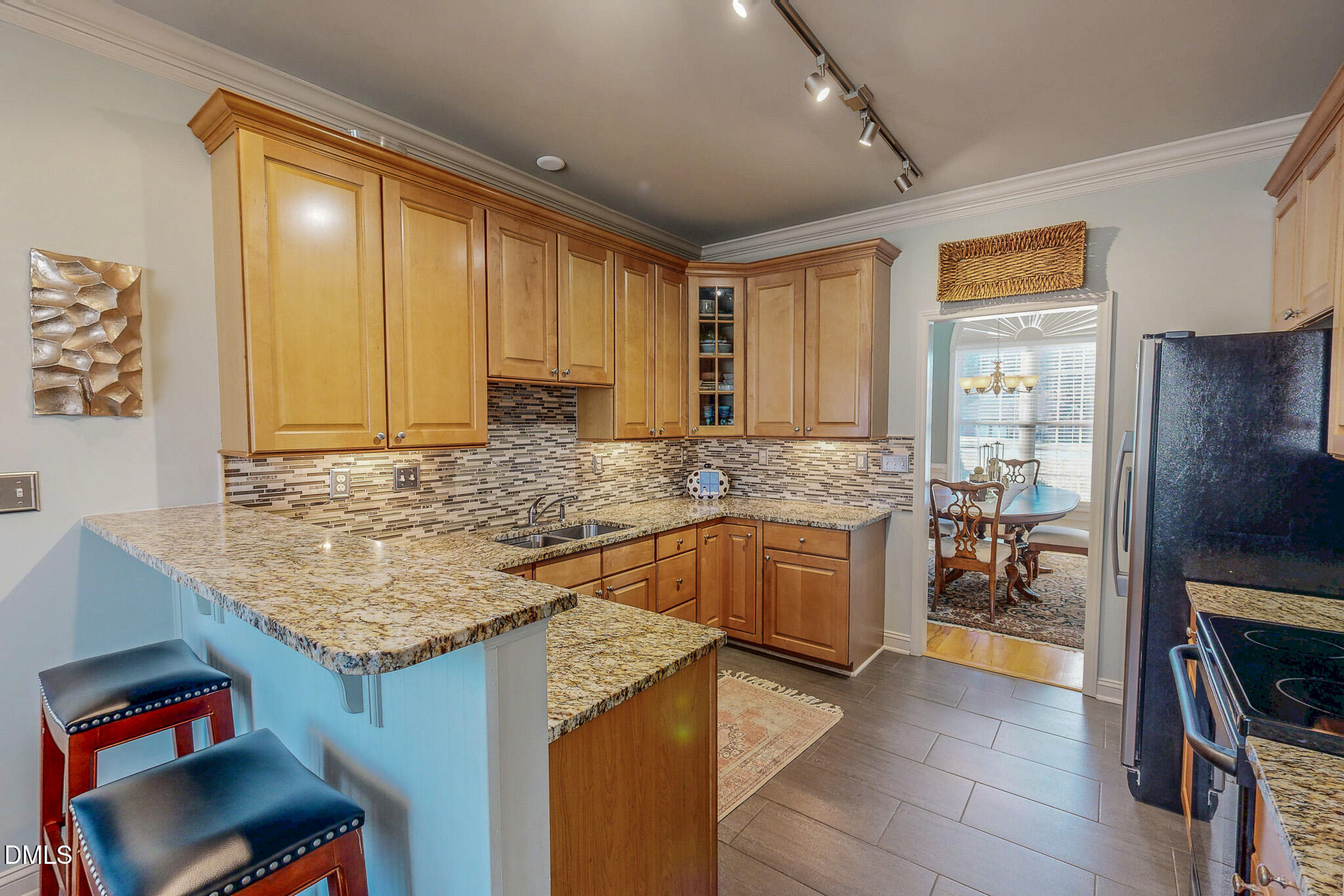 189 Hannah Lane Roxboro, NC 27574 - Photo 3 of 37 a kitchen with granite countertop cabinets and window