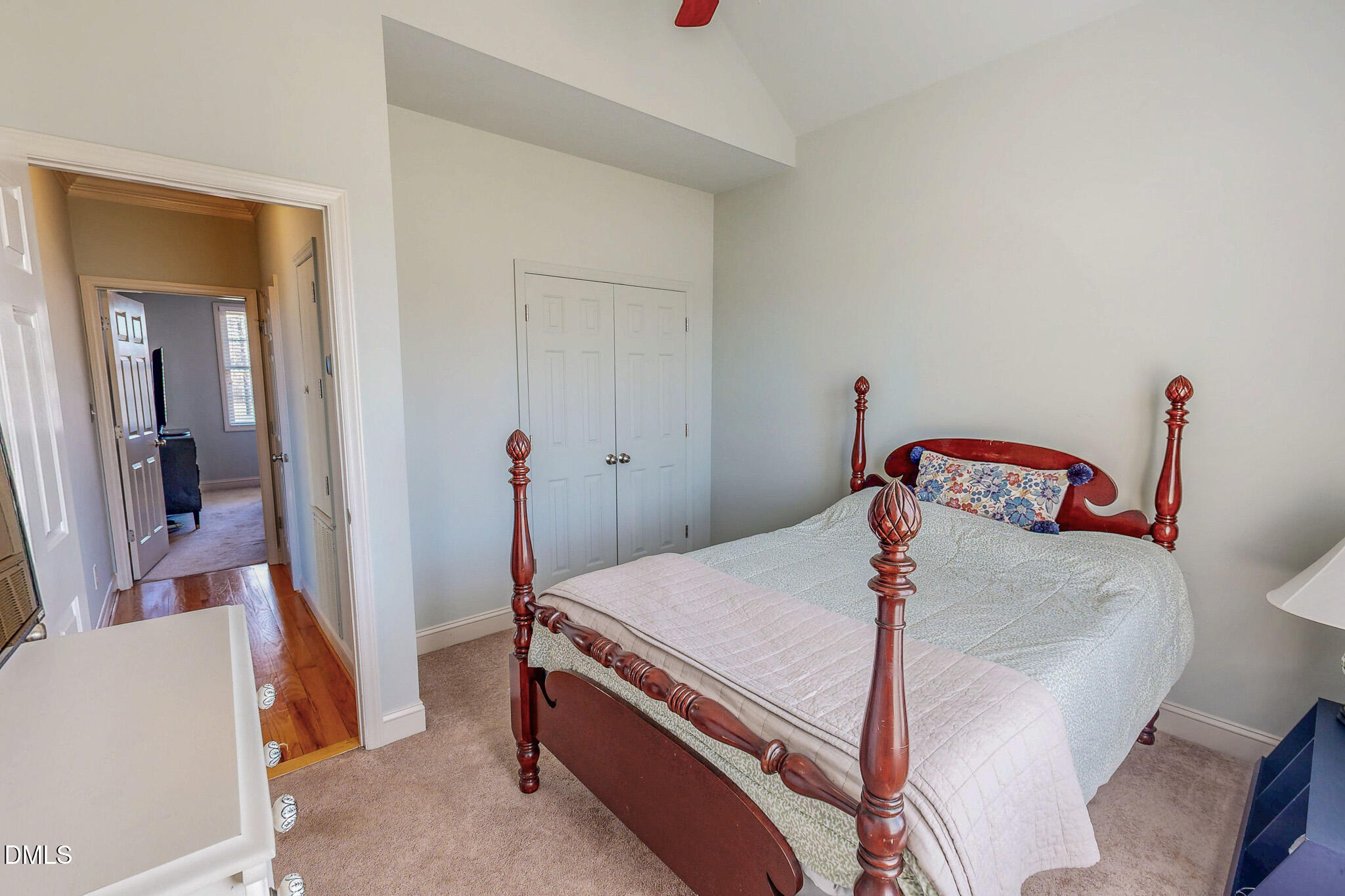 189 Hannah Lane Roxboro, NC 27574 - Photo 32 of 37 a bedroom with a bed and wooden floor