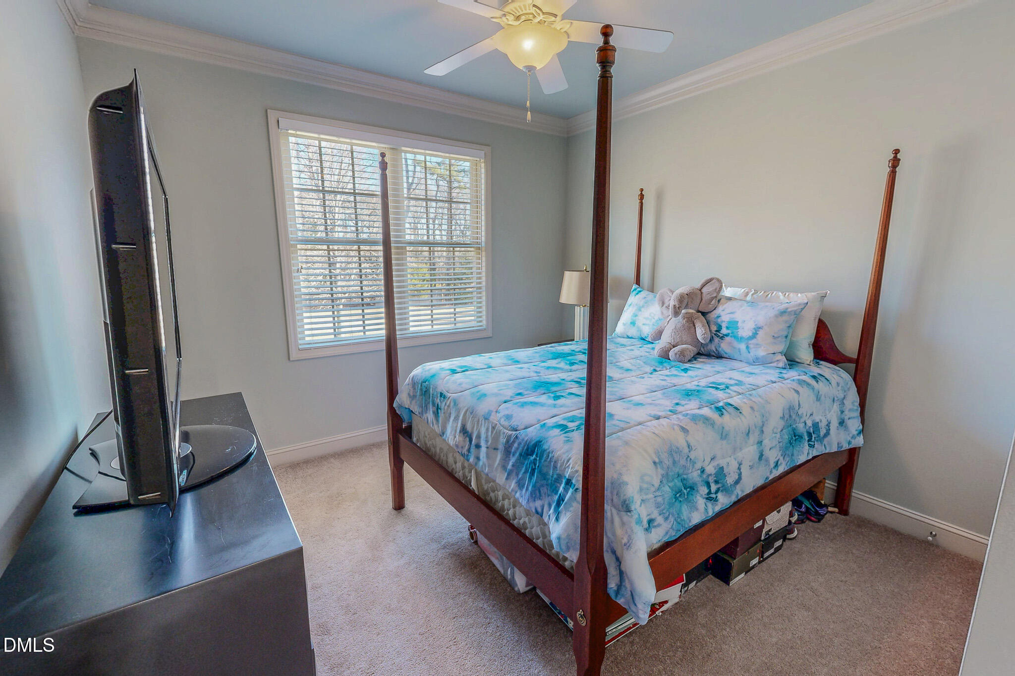 189 Hannah Lane Roxboro, NC 27574 - Photo 33 of 37 a large bed sitting in a bedroom next to a window